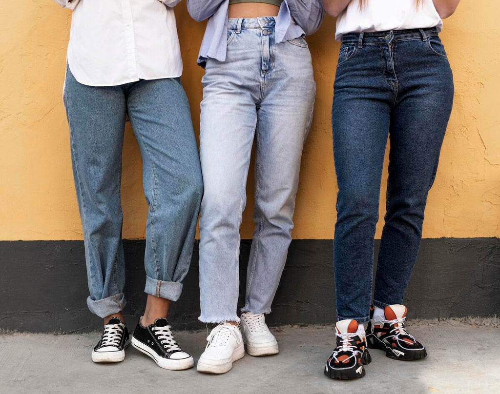 Women wearing straight-leg denim jeans