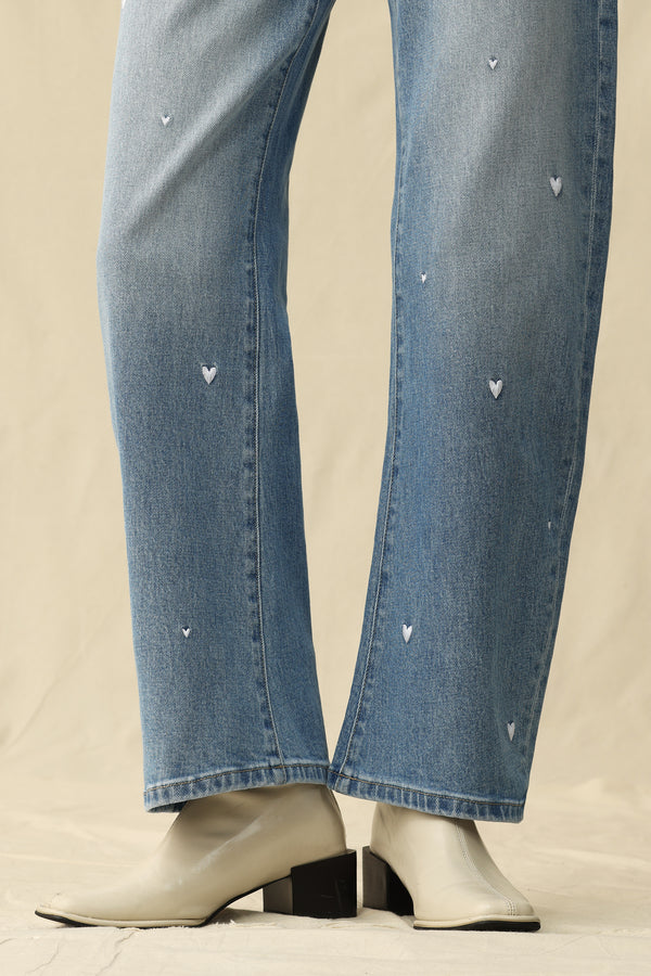 Flora Mid Rise Barrel Jeans