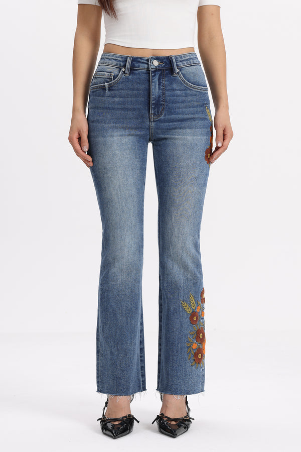 Mid Rise Floral Embroidered Raw Hem Bootcut Jeans