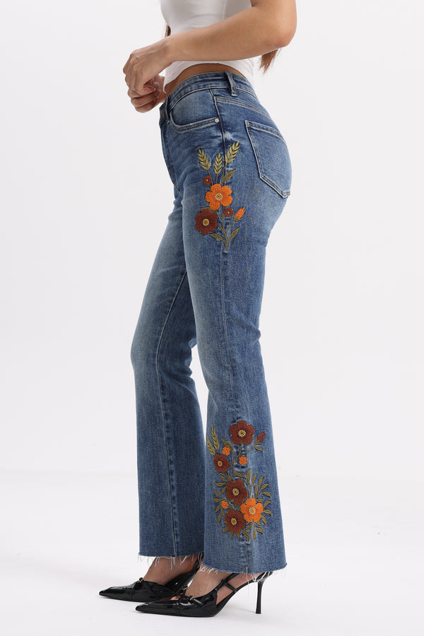 Mid Rise Floral Embroidered Raw Hem Bootcut Jeans