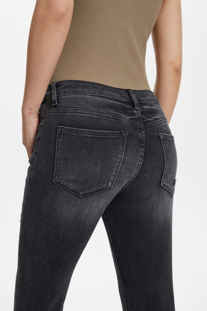 MID RISE FLARE JEANS WITH RAW EDGE HEM